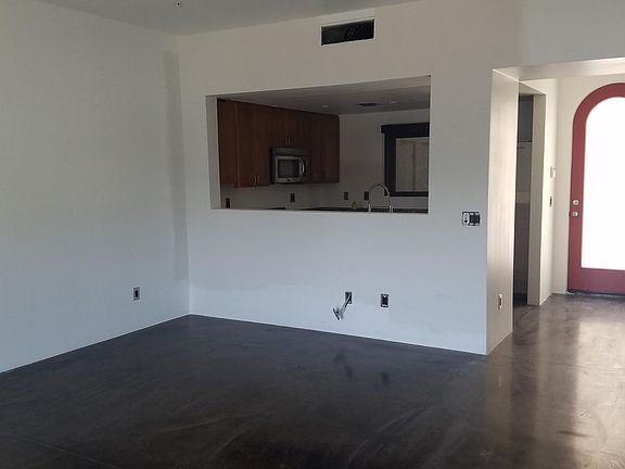 Kitchen open to dining/living area