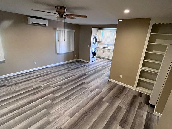 Living room with side in wall bookcase