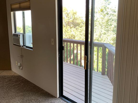 Sliding door to deck with vertical blinds