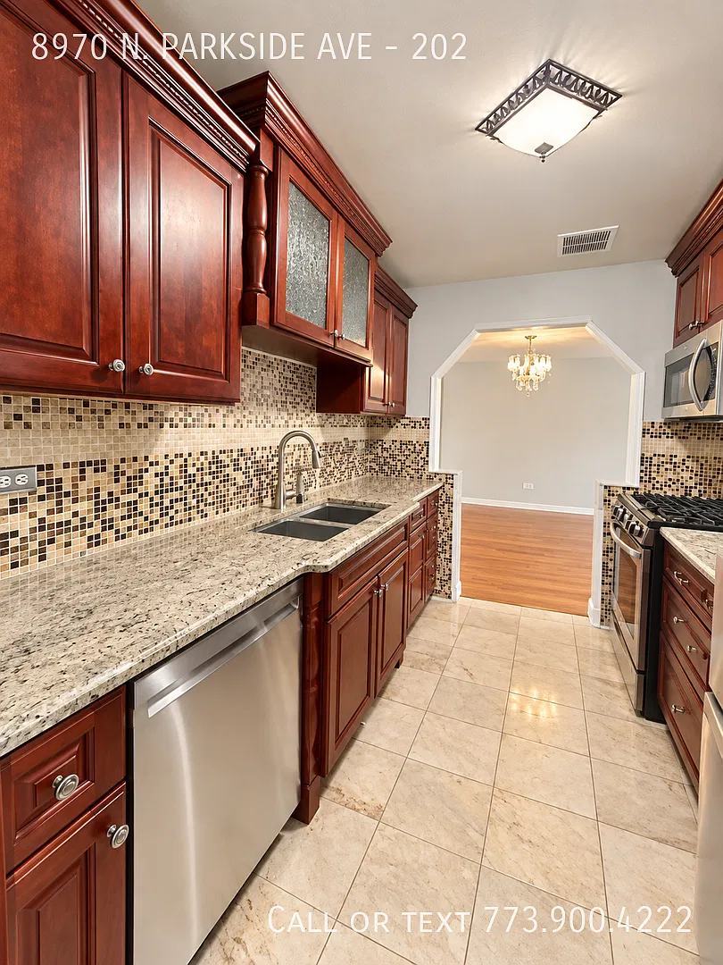 Spacious & Bright 2 Bed, 2 Bath Condo with Private Balcony Heat & More Included! — Photo 3
