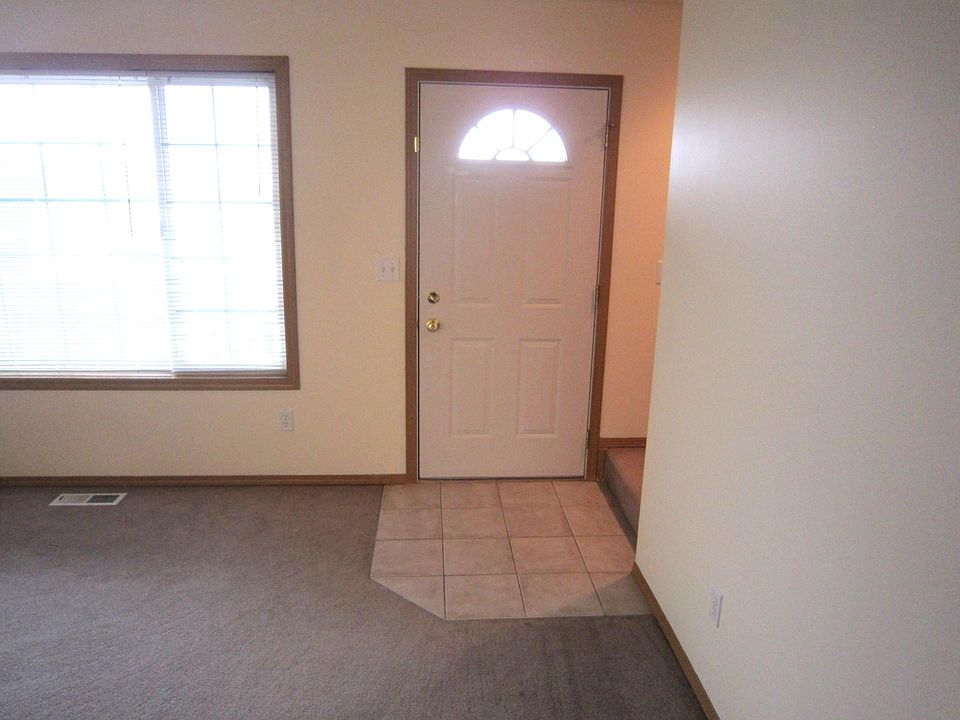 Enter into the front door and large living room area with lots of light