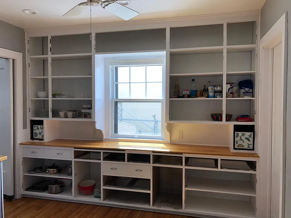 TONS of kitchen storage! Cabinet doors can either remain off or we will put them on for you.