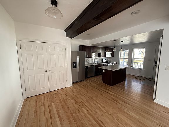 The kitchen is well appointed with refrigerator with water and ice dispenser, oven, microwave, dishwasher and room for a few stools at the island.