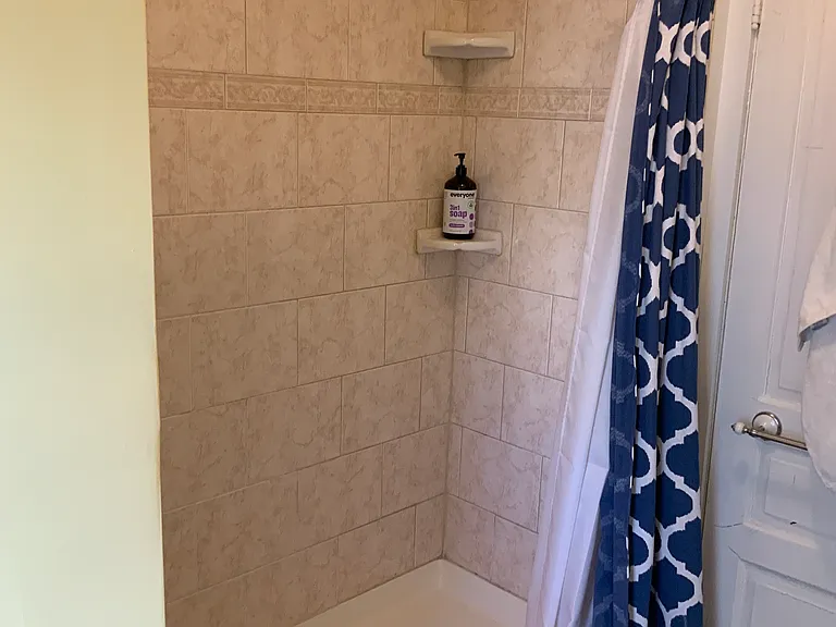Shower in upstairs bathroom was not renovated, because it was perfectly fine as is.