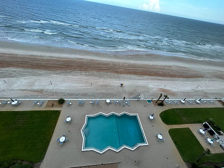 Beautiful view of ocean and swimming pool that is barely ever used