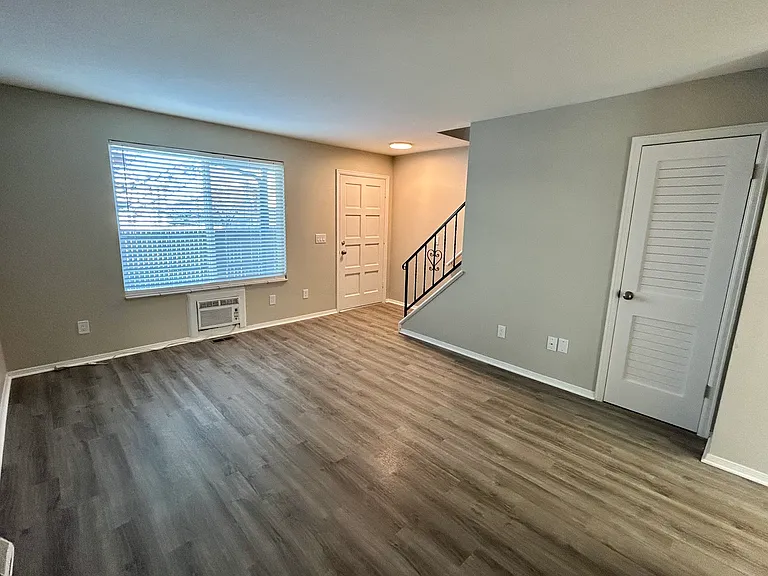 Explore this spacious and inviting modern living room, perfect for relaxation and entertainment. Explore this spacious and inviting modern living room, perfect for relaxation and entertainment.