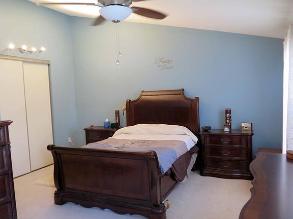 Master bedroom with "his" closet to the left