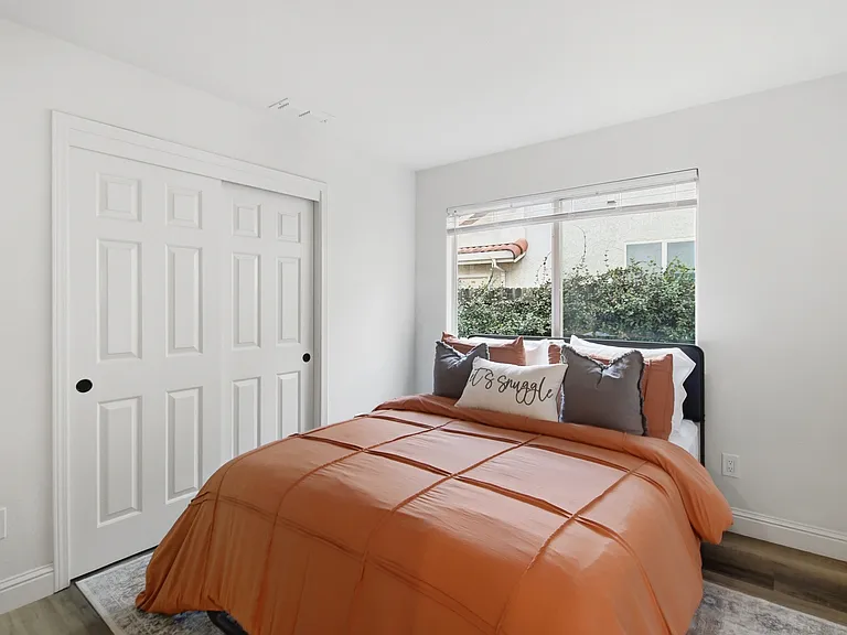 A cozy space designed for restful nights and lazy mornings.