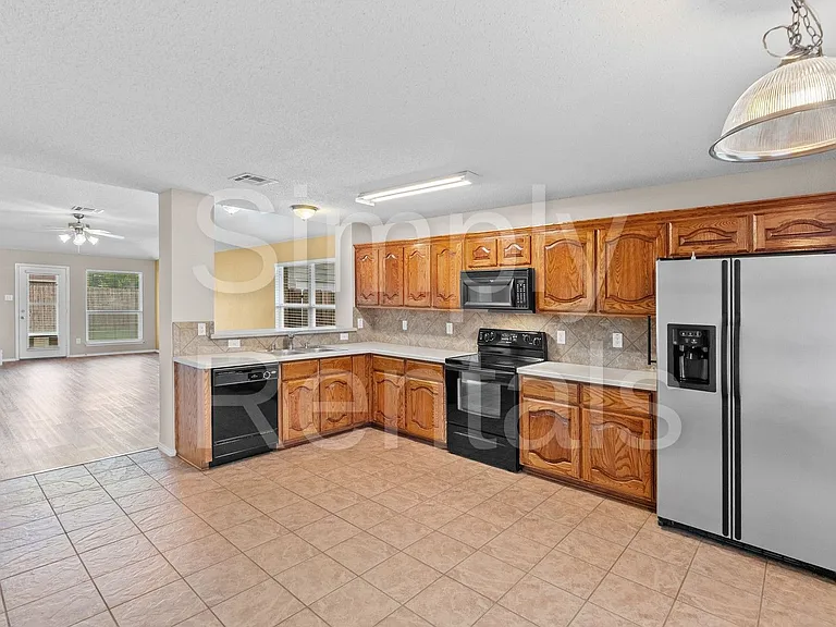 6915 Justin Ln — Photo 6