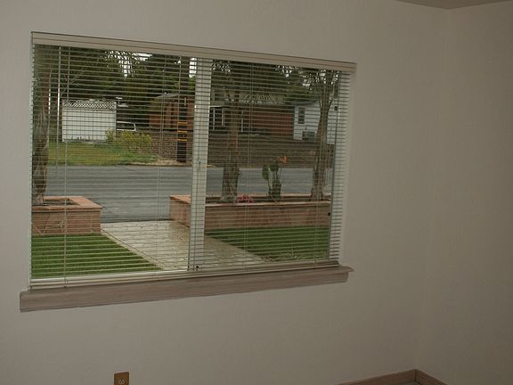 Bedroom with White Stained Floor
