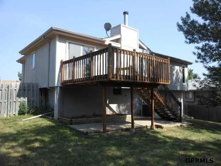 Backyard with one mature tree