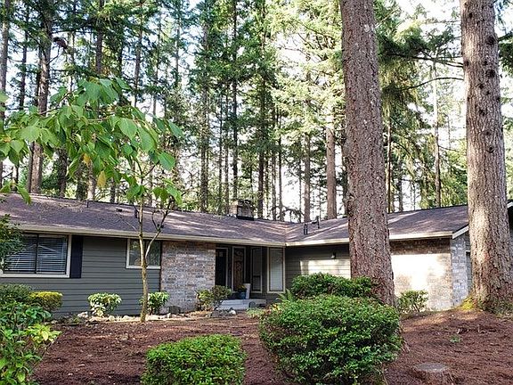Low maintenance landscape. Home is slightly elevated from street, providing additional privacy.