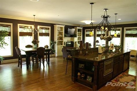 Kitchen Perfect for Entertaining Open to Gathering Room with Gas Log Fireplace