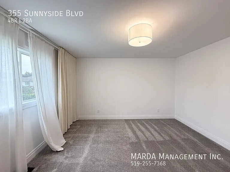 355 Sunnyside Blvd — Photo 34