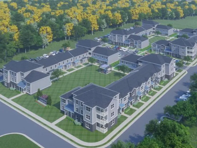 The general plan of the development. Your location is shown with the red circle, and the blue circle is the location of your parking spots. Take note of the common area that you can access from your back door. Here each unit has its private porch.