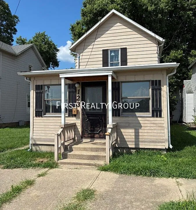 123 E 6th St