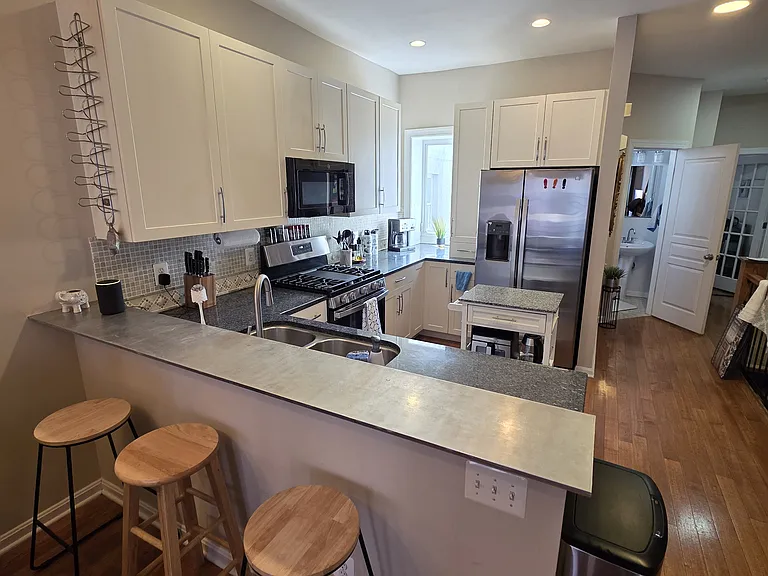 large kitchen with all the tools and appliances to make your favorite meal. Or just order in. Very functional