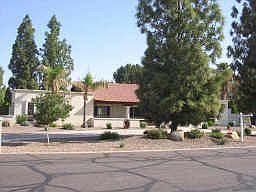 Large circle drive and side entry garage