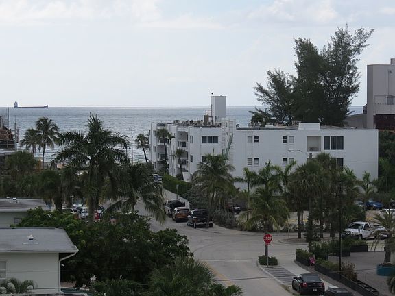 Another view of the ocean and surrounding buildings.