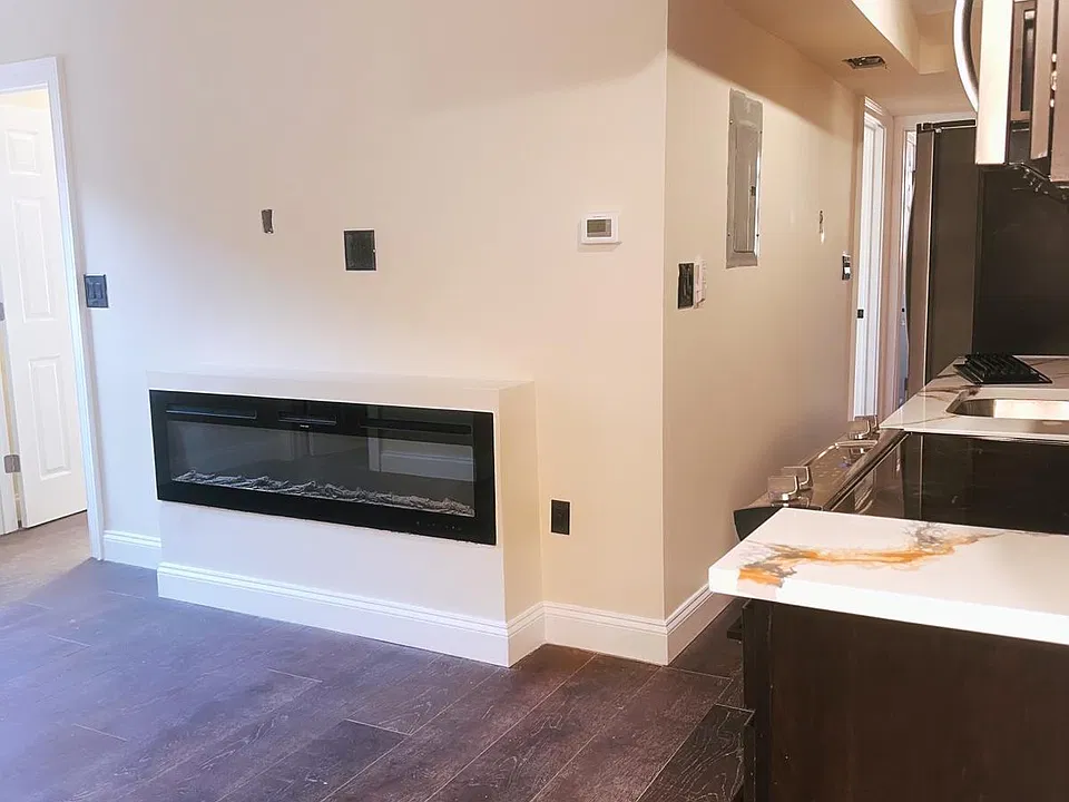 Living area with beautiful updated furnace.