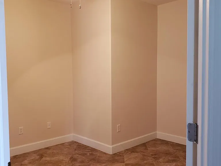 Den, next to the kitchen