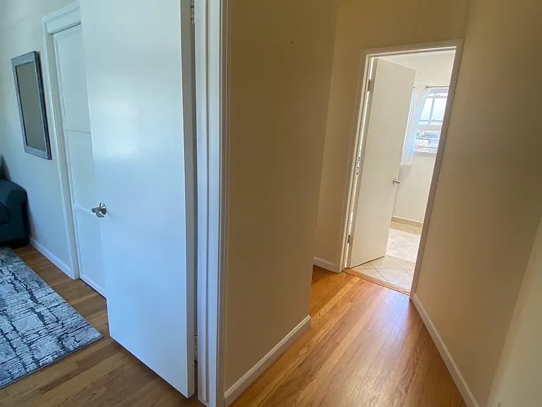 Hallway from bedroom to Bath and main room