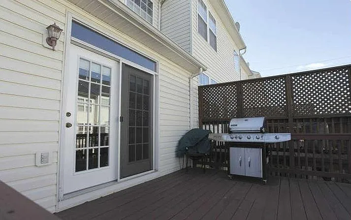 Deck with Natural gas Grill which will be staying