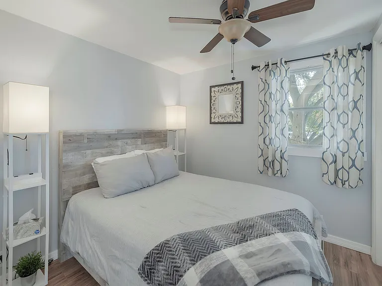 Bedroom 1 w/ Queen Bed, End Tables, Closet, Storage, Smart TV