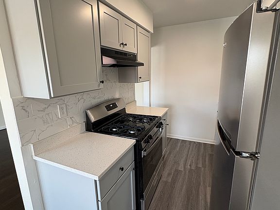 newly refurbished kitchen with stainless steel appliances