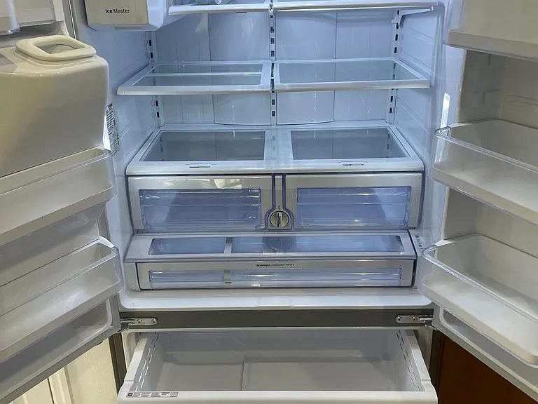 Oversized refrigerator with ice and water in the door