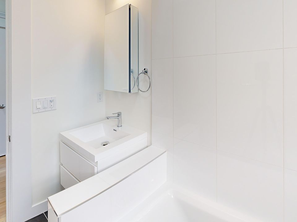 Bathroom with sink and bathtub