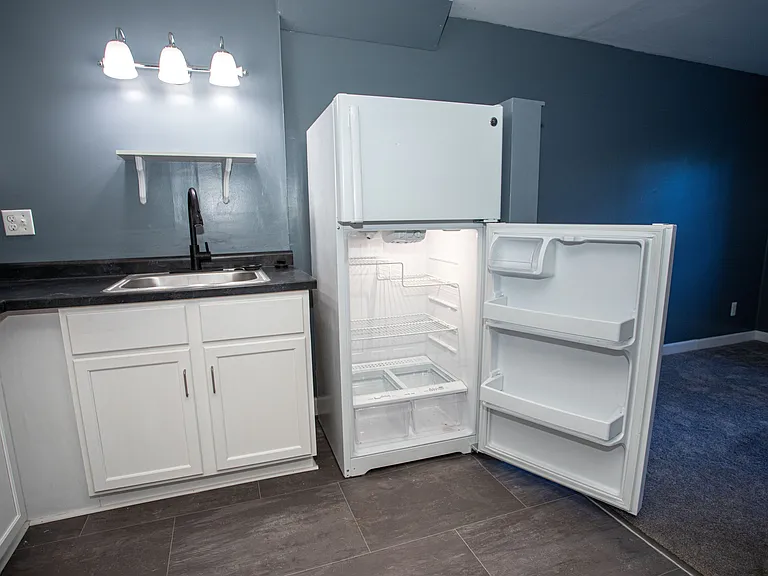 5516 NW Cimarron Dr — Photo 5