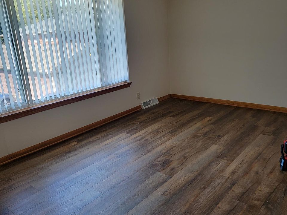 Living room with all new plank flooring.