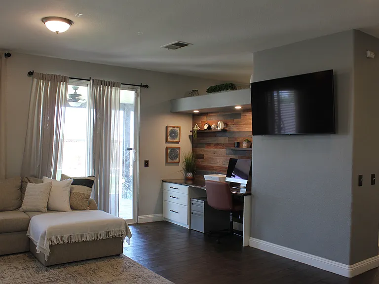 Open-concept family room with built-in office