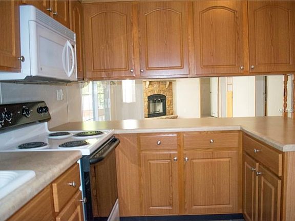 Kitchen with view of living area.