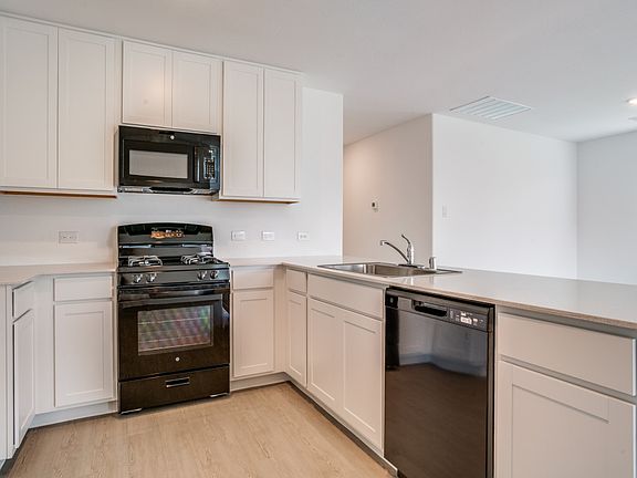 Gas range, Microwave and Dishwasher. Brand new refrigerator will be provided by landlord.