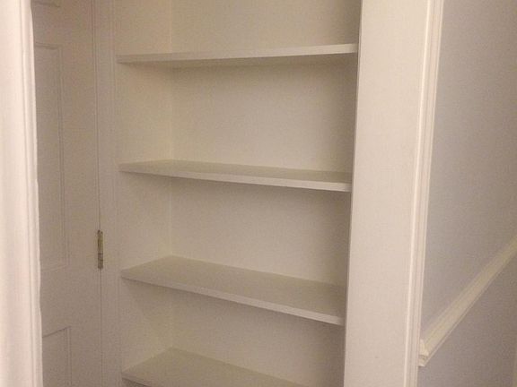 Built in shelves in entry