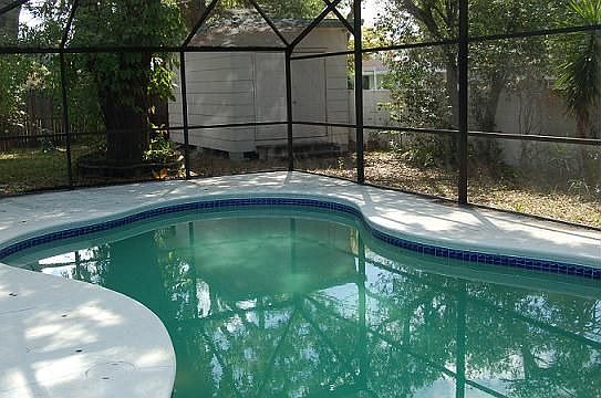 Screened in Patio & Pool w/ Workshop in Backyard w/ Electric