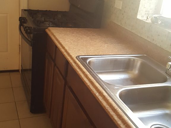 2nd image of 7204 S Cornell Avenue # Fl 1ST