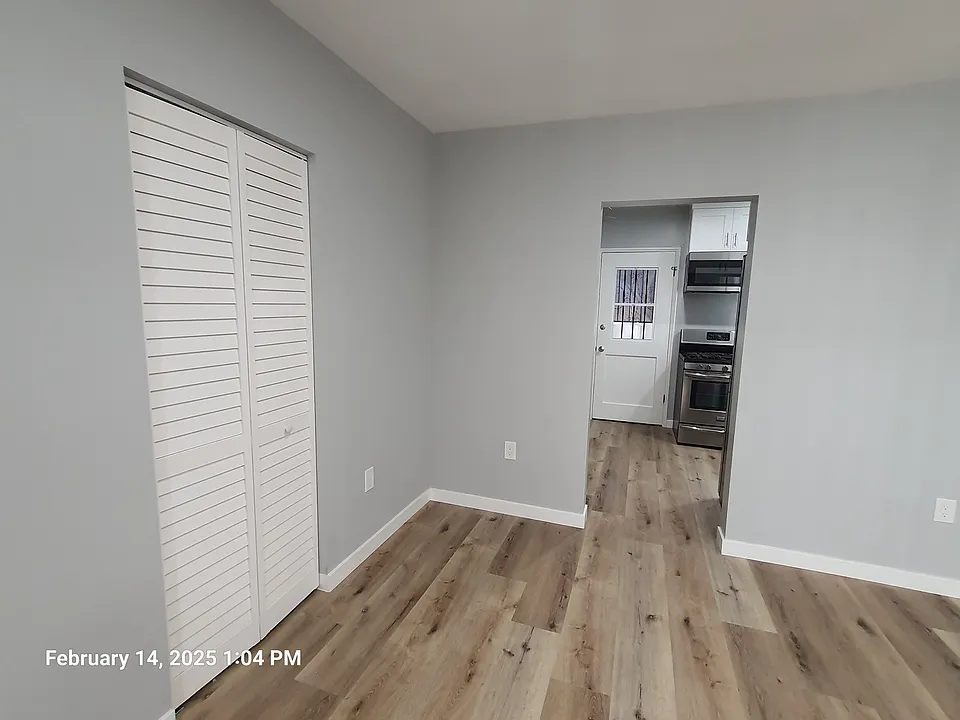 Living room looking into kitchen