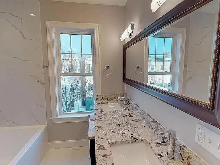 Large primary bathroom with double sinks