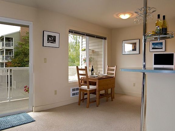 The functional dining room and stylish bistro bar, with sliding doors for entr