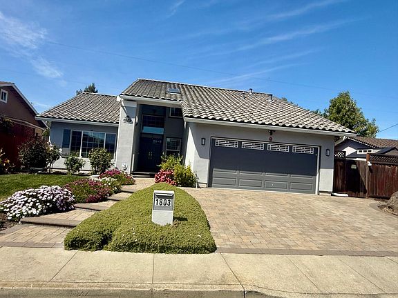 Paved Driveway and front elevation
