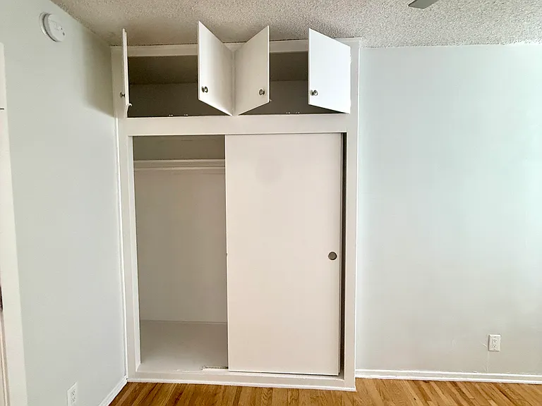 Bedroom closet and cabinets.