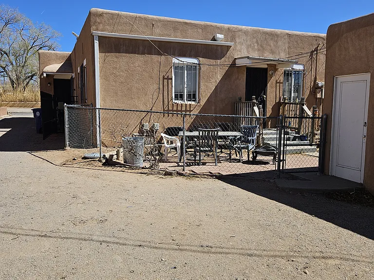 219
Outdoor parking space and patio area
