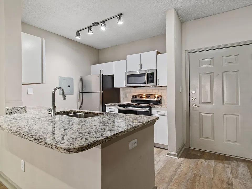 Cook, dine, and gather in a stylish kitchen space.