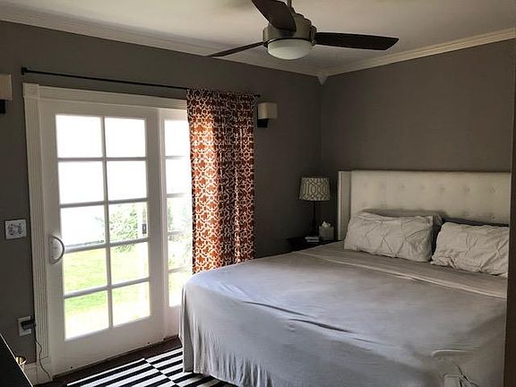 1st Bedroom, Sliding glass door opens to enclosed backyard.