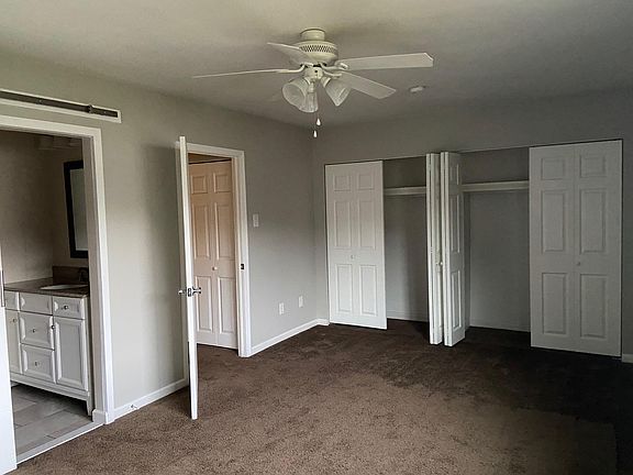 Master bedroom with en suite bathroom and double closet space