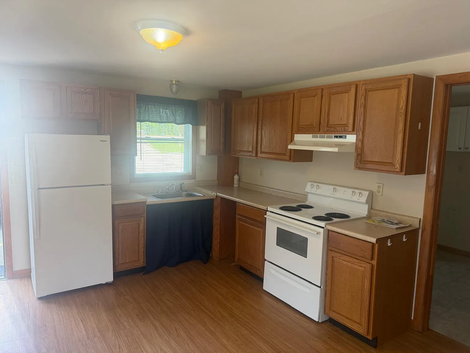 Bright & Spacious 1BR Duplex with Off-Street Parking & Laundry Hookups — Photo 1
