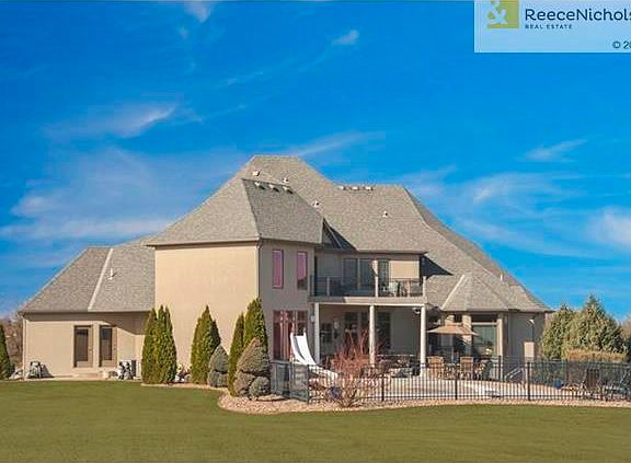 20x40 foot salt water pool in the back of the house with slide and diving board. Pool offers an auto electric cover.  Landscaping with decorative concrete curbing all the way around house.